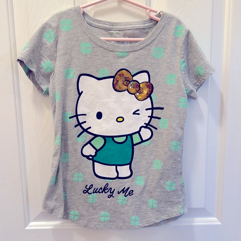 Hello Kitty T-Shirt size M (7-8) EUC
Lucky Me